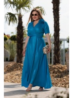 Połyskująca sukienka maxi asymetryczna wiązana po boku w kolorze niebieskim z różą. MODEL: EB- 8998